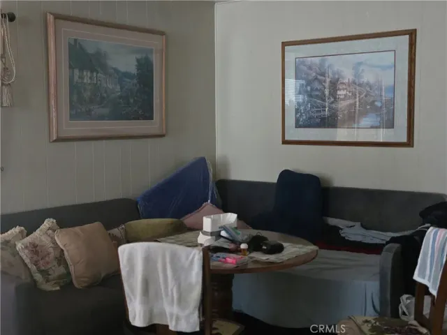 a kitchen with granite countertop a sink stove and cabinets