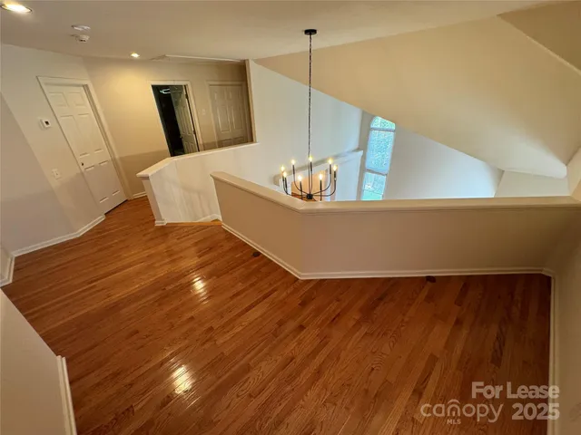 a living room with wooden floor