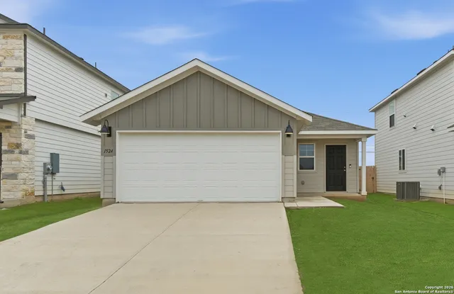 a front view of house with yard