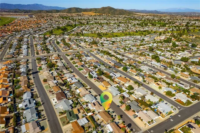 an aerial view of residential building with parking space