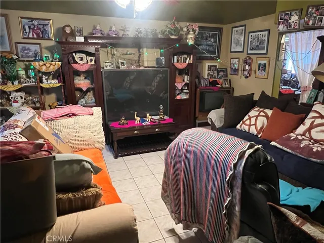 a bedroom with furniture and a bed