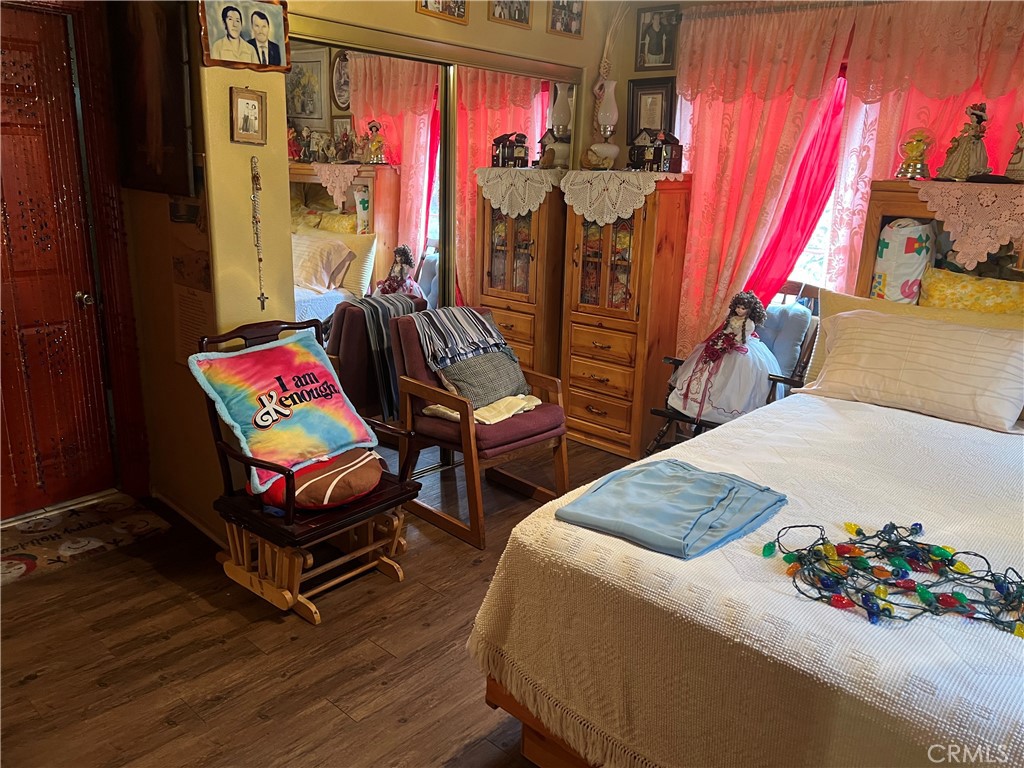 8310 South Broadway Los Angeles, CA 90003 - Photo 19 of 28 a bedroom with two beds and a bed