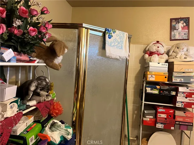 a bathroom with a sink mirror and vanity