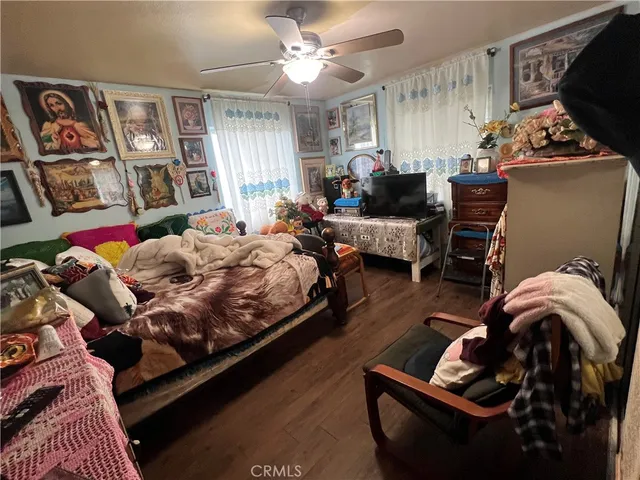 a bedroom with furniture and a couch