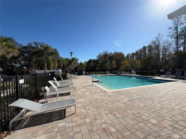 a view of a house with a swimming pool