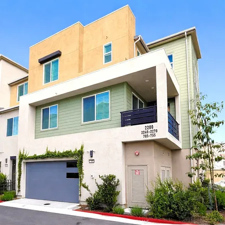 a view of a house with a garage