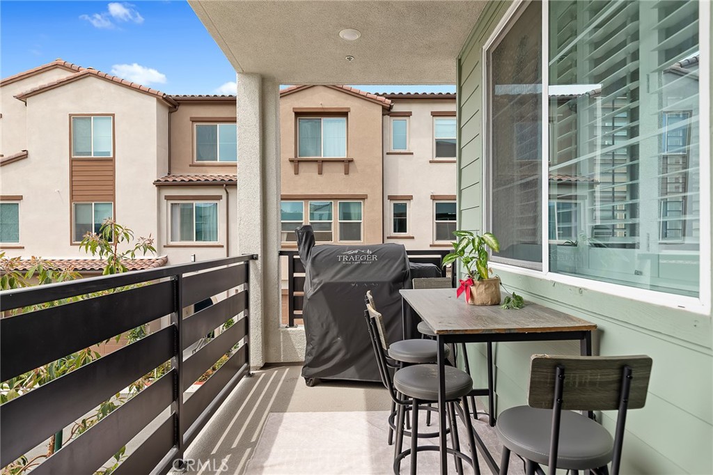 705 Arrowleaf Road Rancho Mission Viejo, CA 92694 - Photo 12 of 48 a view of a dining room with furniture and window