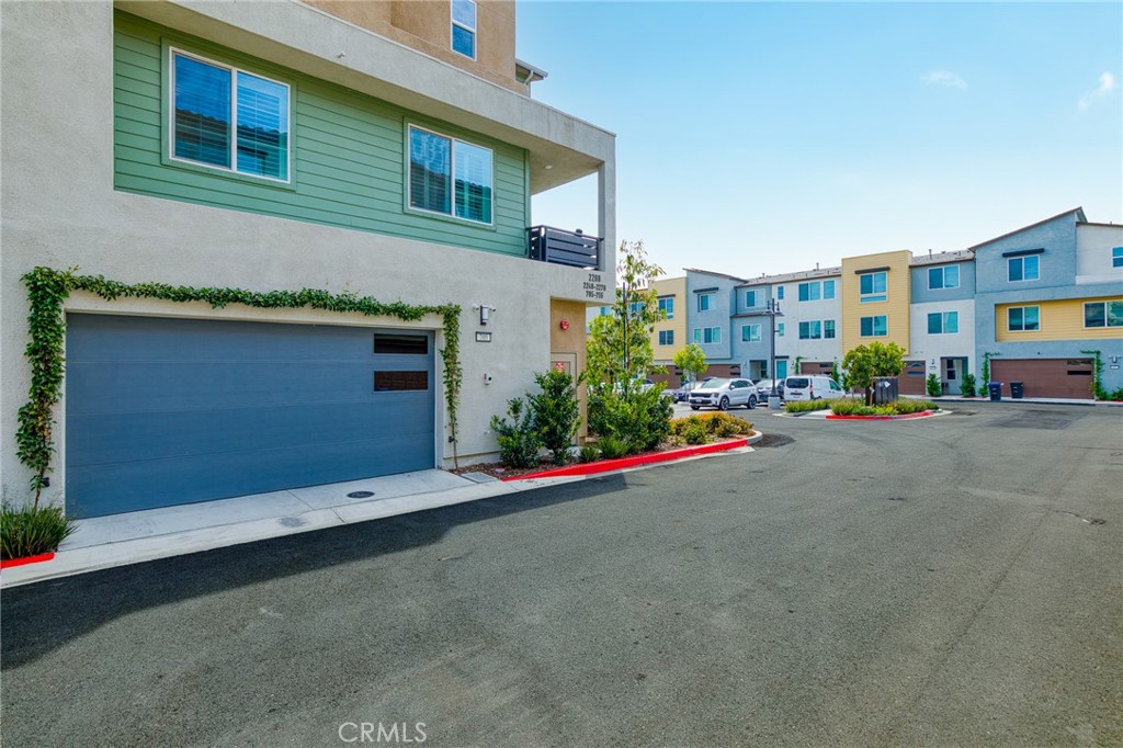 705 Arrowleaf Road Rancho Mission Viejo, CA 92694 - Photo 30 of 48 a view of street with large building