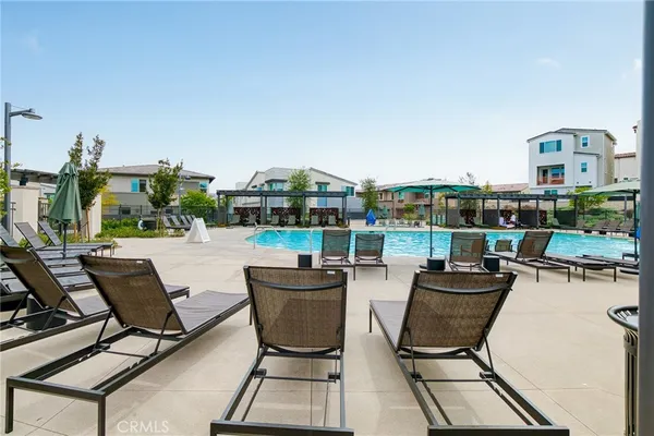 a view of a terrace with furniture and garden