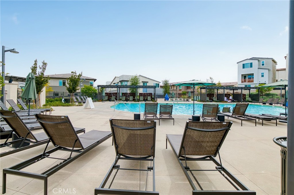 705 Arrowleaf Road Rancho Mission Viejo, CA 92694 - Photo 35 of 48 a view of a terrace with furniture and garden