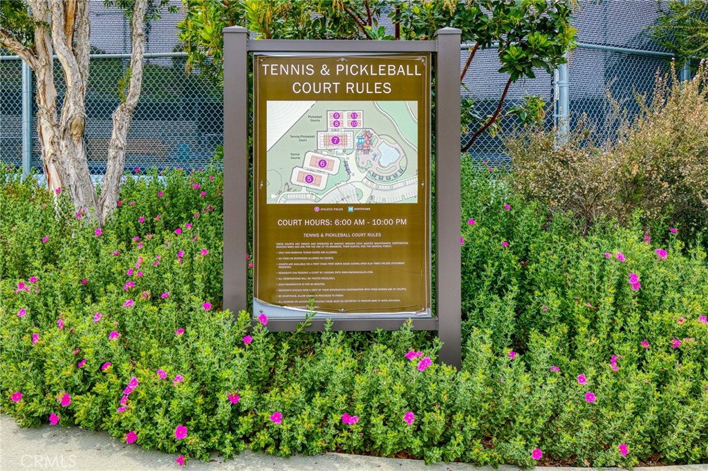 705 Arrowleaf Road Rancho Mission Viejo, CA 92694 - Photo 42 of 48 a sign that is in front of flowers