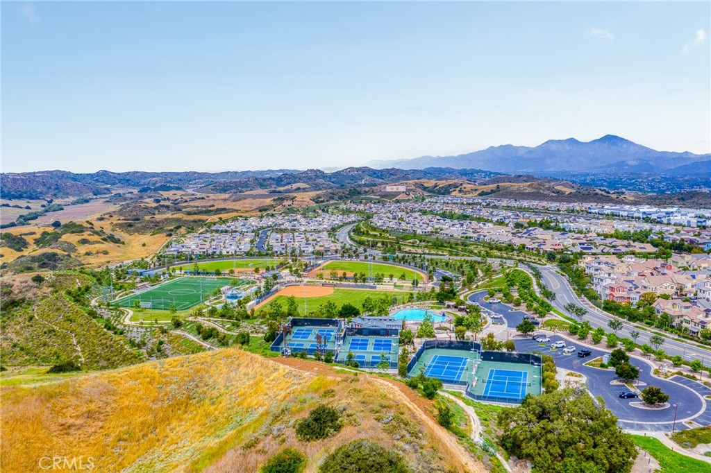 705 Arrowleaf Road Rancho Mission Viejo, CA 92694 - Photo 45 of 48 a view of a city with mountains in the background