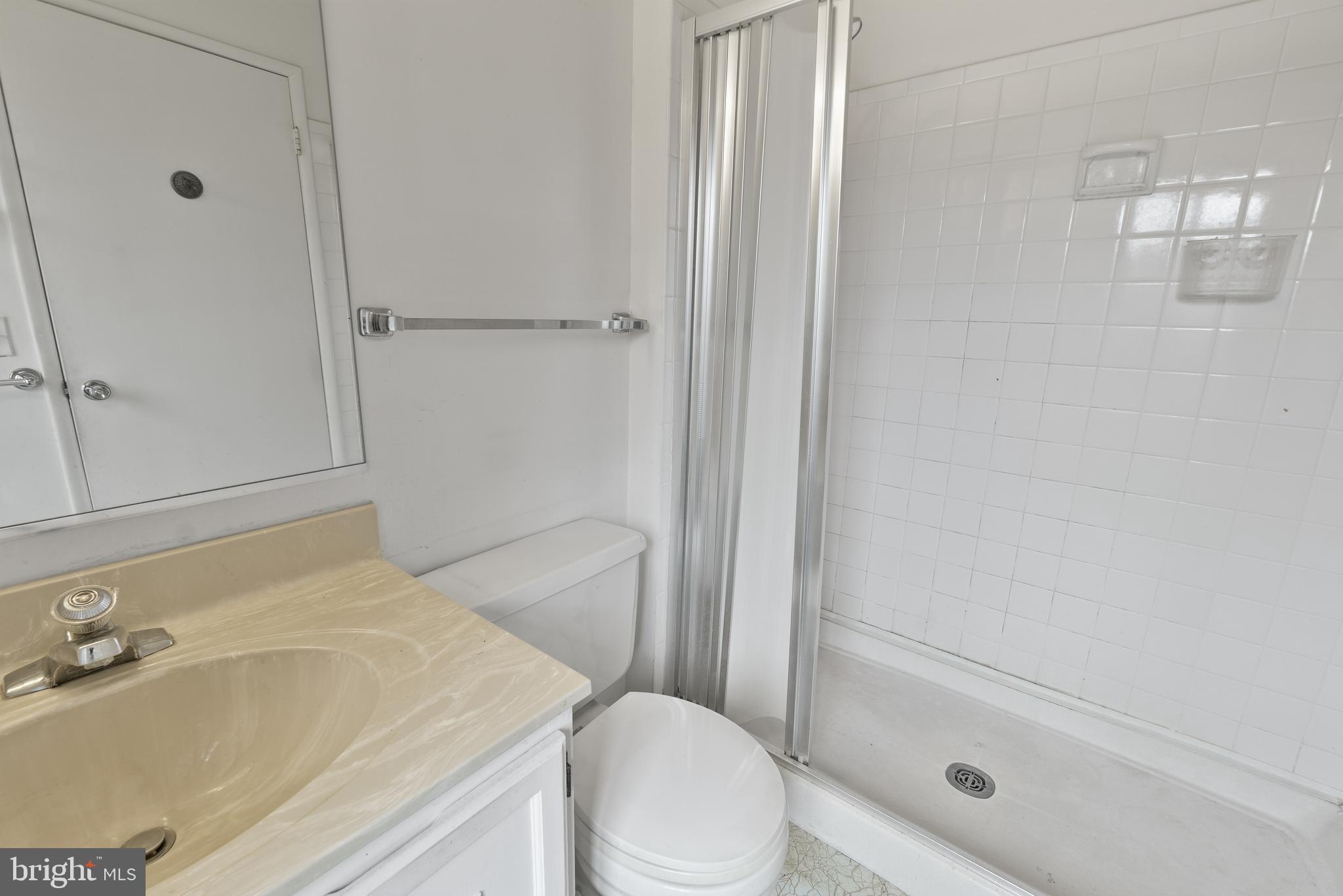 15300 Beaverbrook Court, Unit 883F Silver Spring, MD 20906 - Photo 20 of 31 a bathroom with a sink and toilet