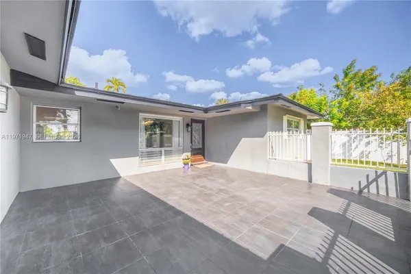 a view of a house with a patio
