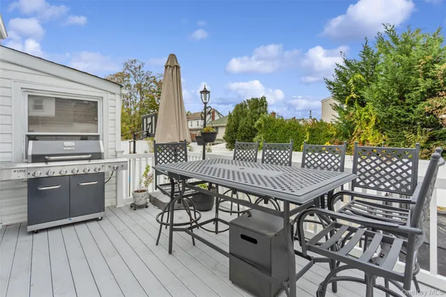 a dinning table and chairs in a patio