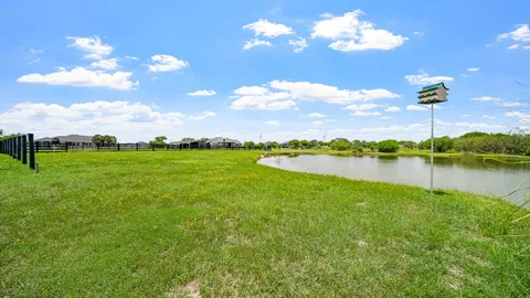 a view of a backyard of the house