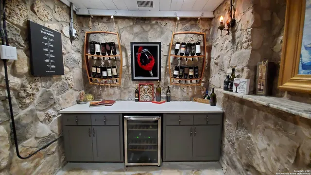 a bathroom with a sink vanity and a mirror
