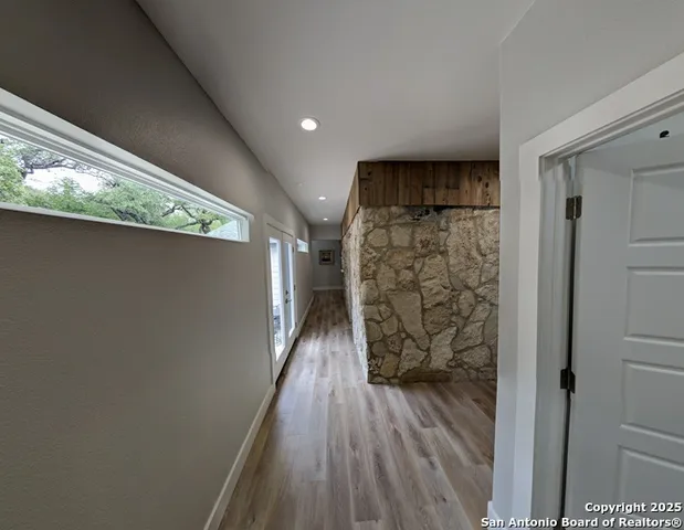 a view of an entryway with a hallway