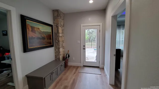 a bedroom with a bed and a walk in closet