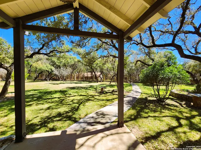 a view of a yard with an outdoor space