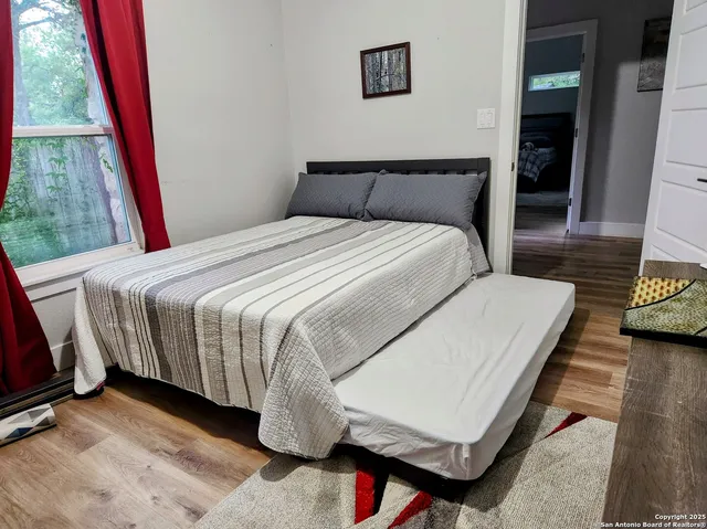 a view of livingroom with furniture and white walls