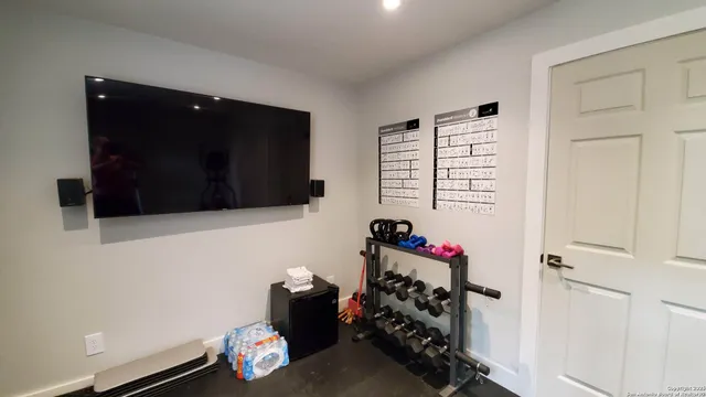 a view of a room with gym equipment