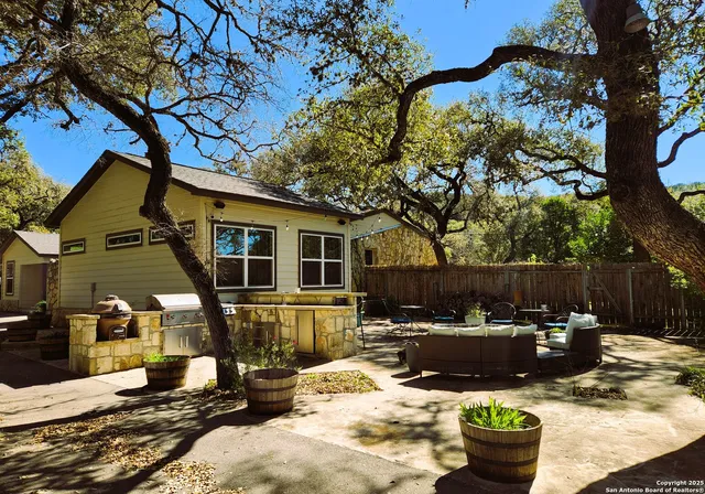 a view of a swimming pool with a patio