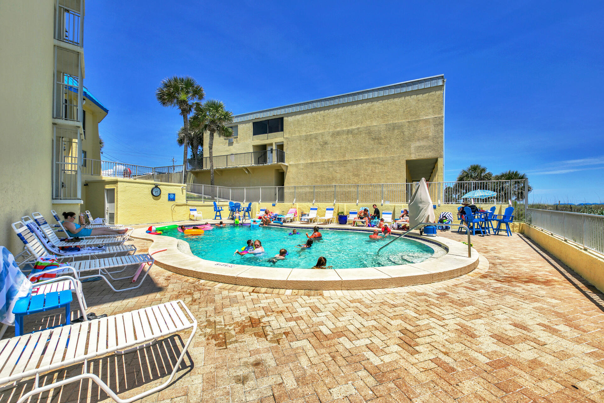 15413 Front Beach Road, Unit 406 Panama City Beach, FL 32413 - Photo 12 of 21 a view of a chairs and table in a patio