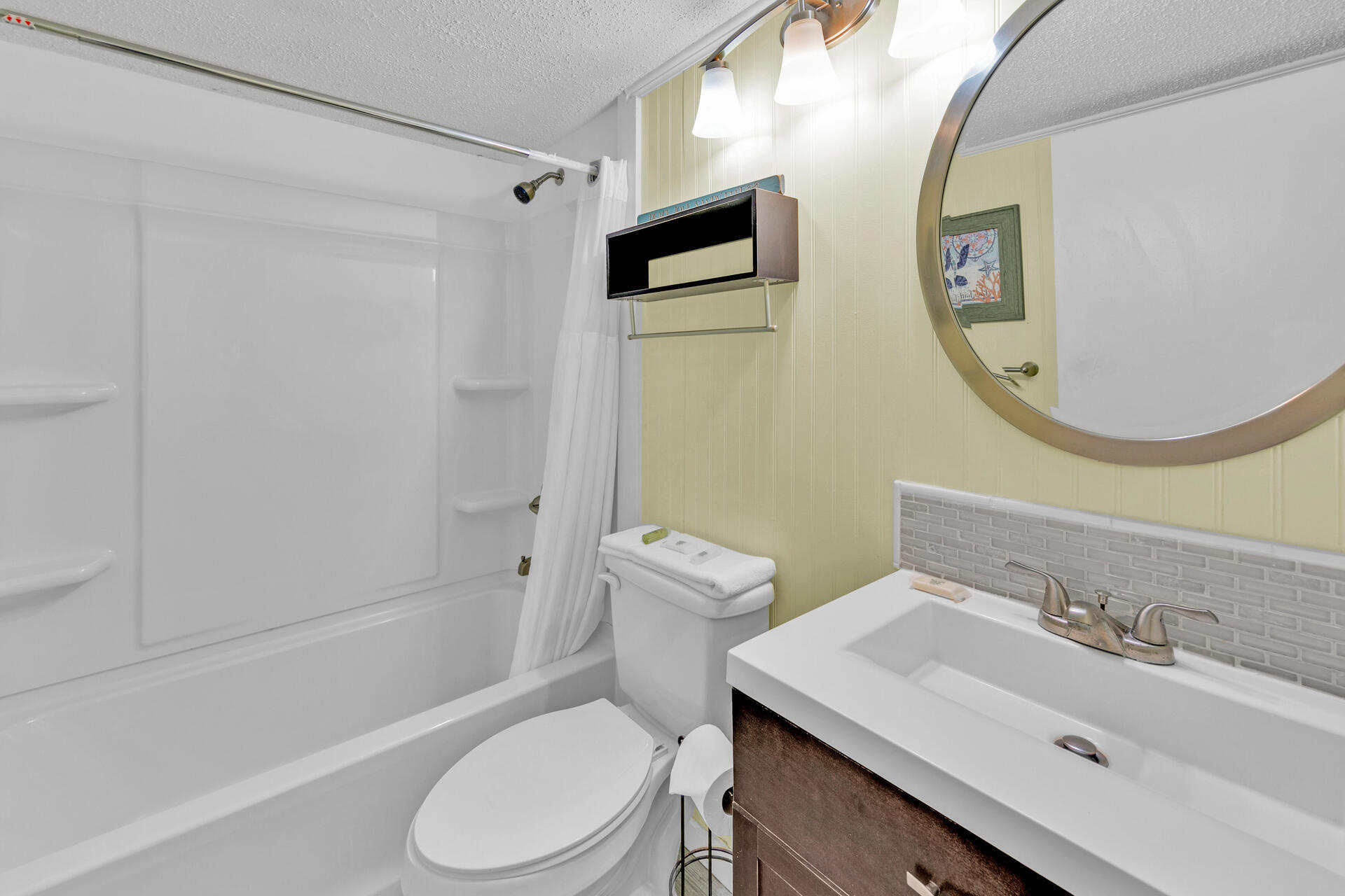 15413 Front Beach Road, Unit 406 Panama City Beach, FL 32413 - Photo 7 of 21 a bathroom with a sink toilet and shower