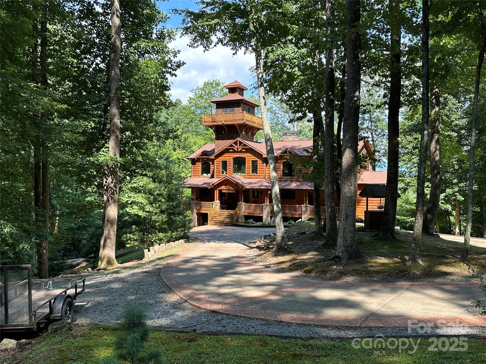 67 Peppervine Circle Rosman, NC 28772 - Photo 18 of 48 a front view of a house with a yard