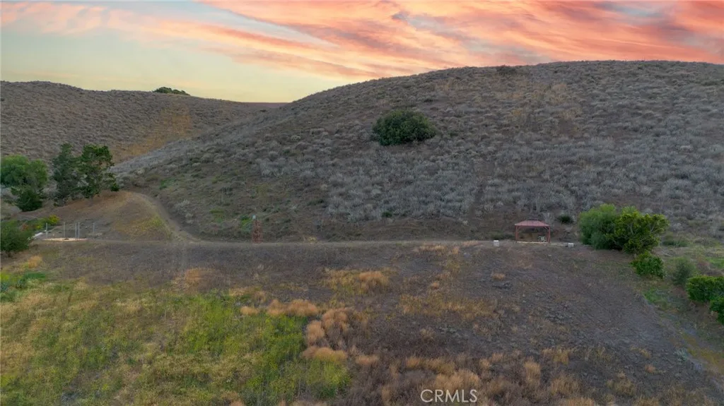 4944 Read Moorpark, CA 93021 - Photo 9 of 19 a view of a dry yard with mountains in the background