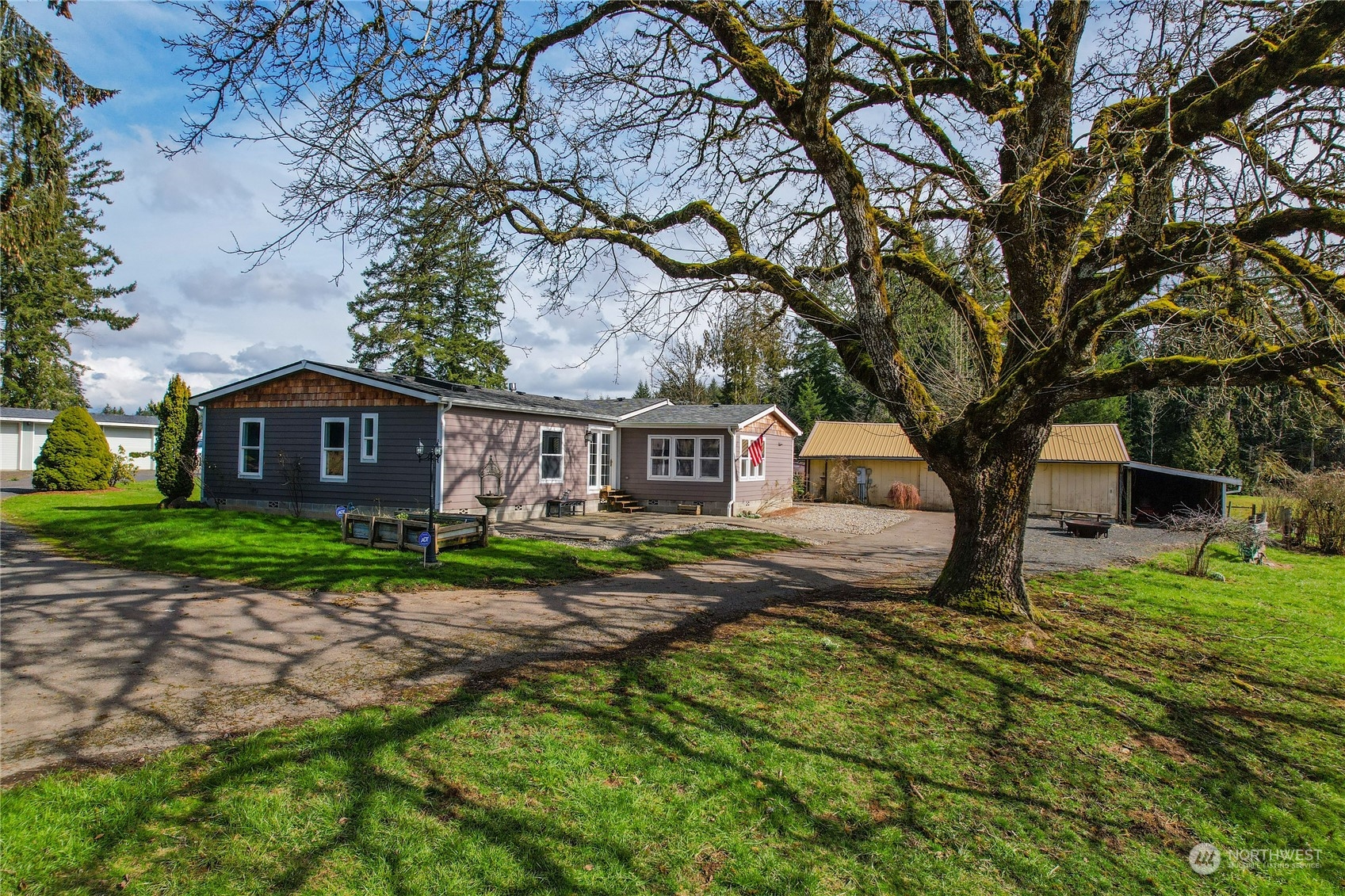 219 Lindbeck Road Winlock, WA 98596 - Photo 1 of 35 a front view of a house with garden