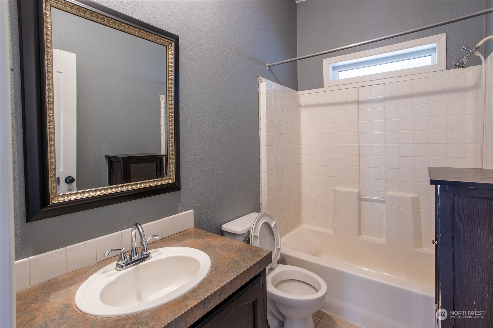 219 Lindbeck Road Winlock, WA 98596 - Photo 11 of 35 a bathroom with a sink toilet and shower