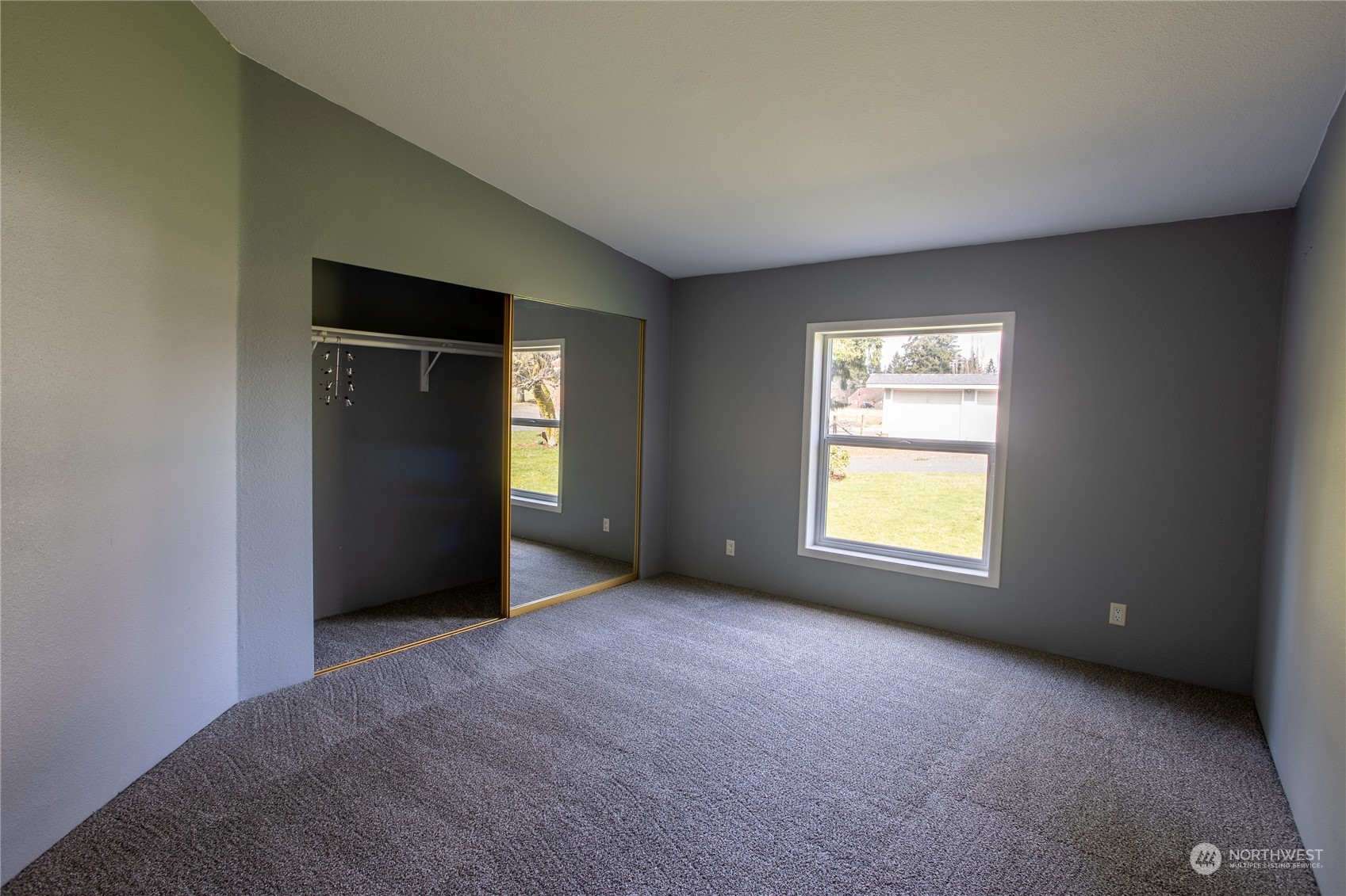 219 Lindbeck Road Winlock, WA 98596 - Photo 13 of 35 an empty room with a window and a dresser
