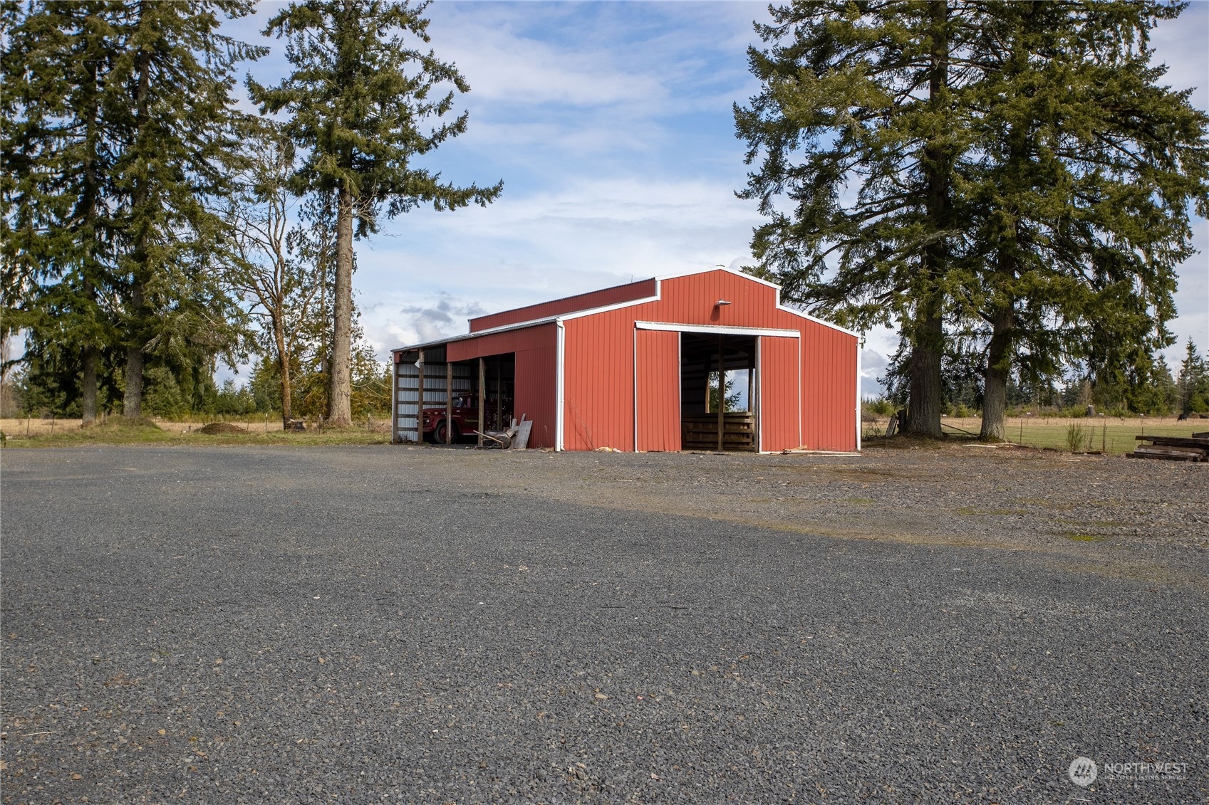 219 Lindbeck Road Winlock, WA 98596 - Photo 21 of 35 a front view of a house with a yard and garage