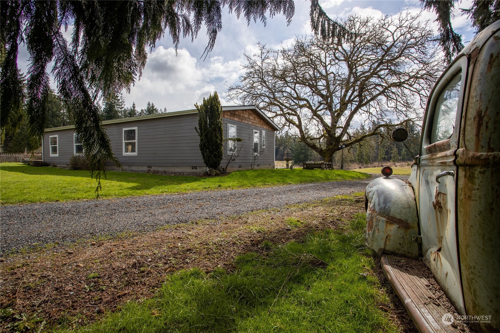 219 Lindbeck Road Winlock, WA 98596 - Photo 26 of 35 a view of a backyard with large trees