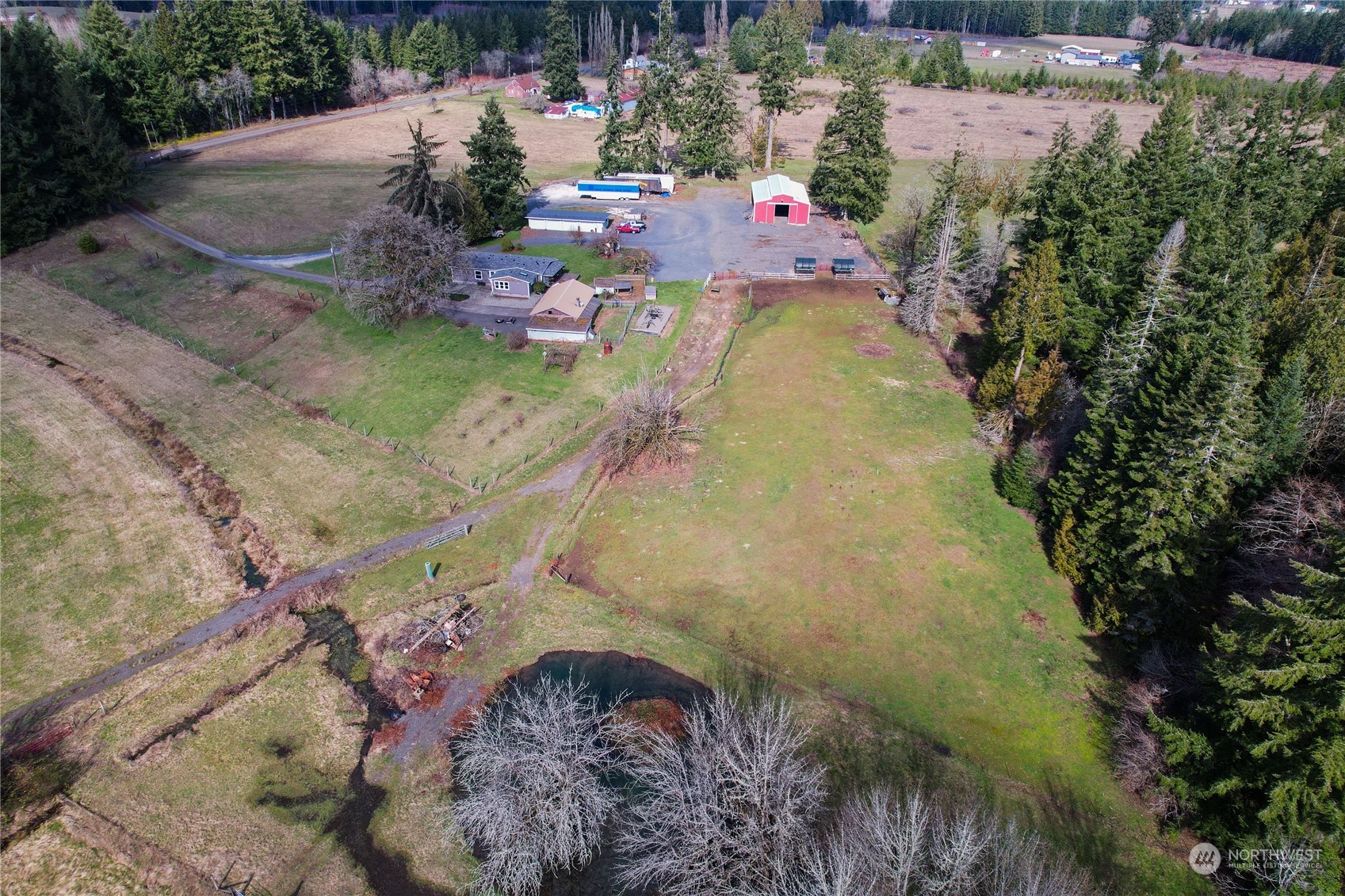 219 Lindbeck Road Winlock, WA 98596 - Photo 31 of 35 a aerial view of a house with a yard