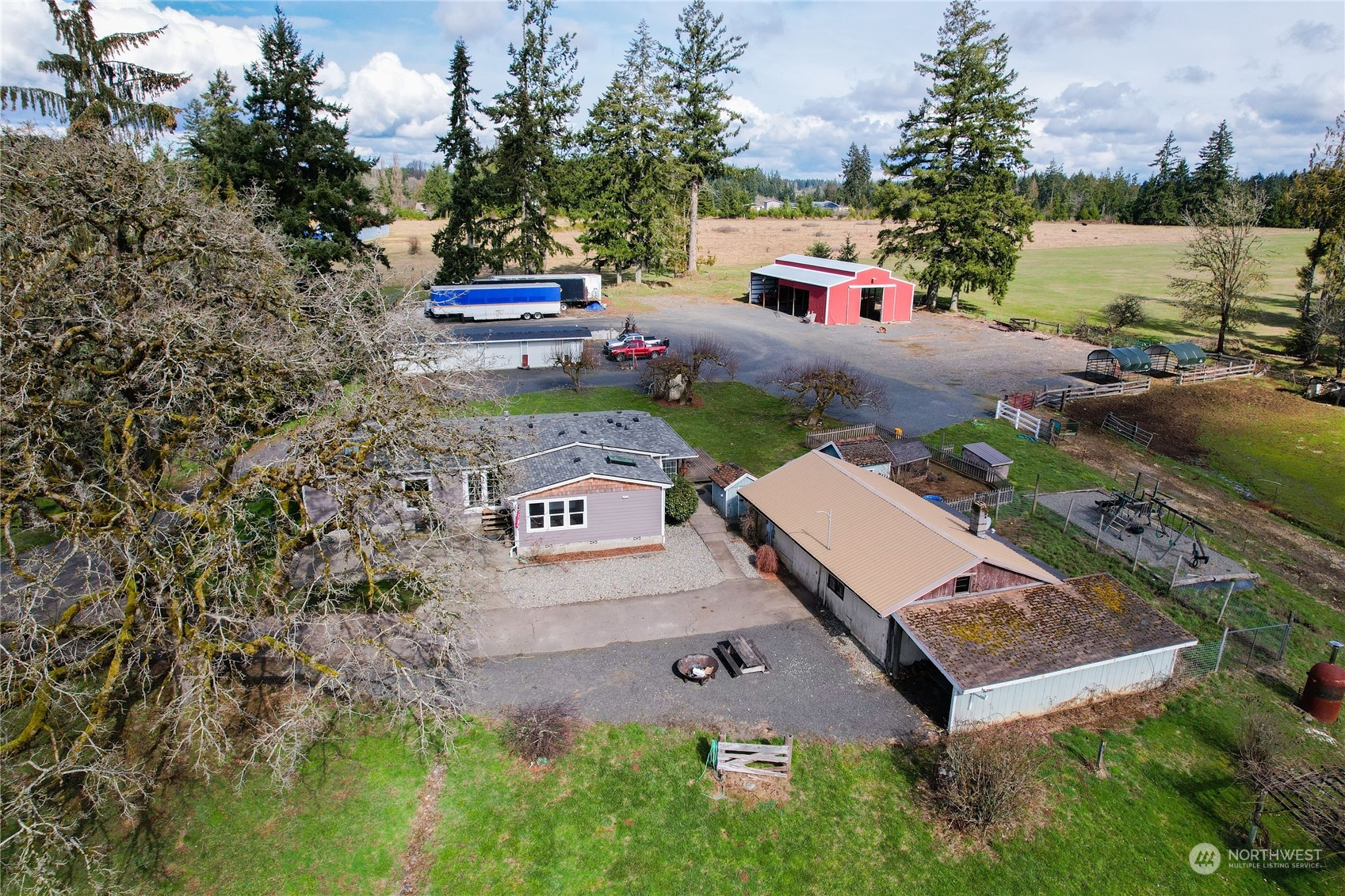 219 Lindbeck Road Winlock, WA 98596 - Photo 34 of 35 an aerial view of a house with garden space and street view