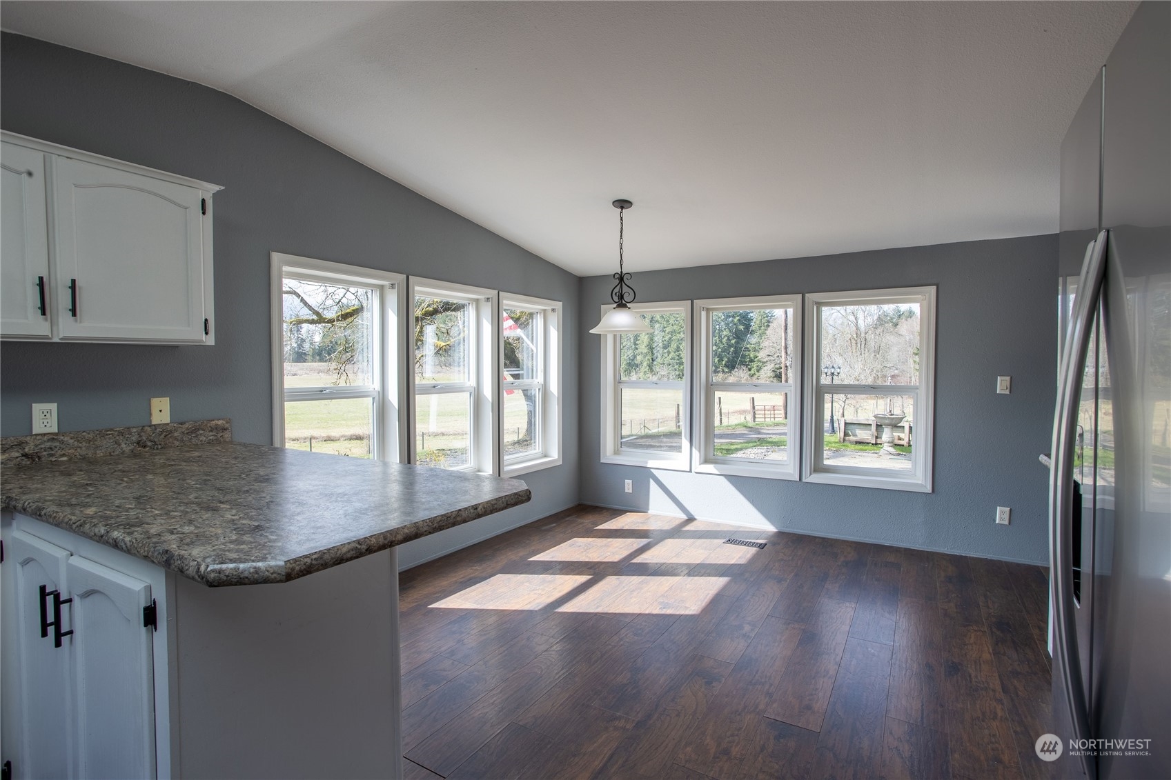 219 Lindbeck Road Winlock, WA 98596 - Photo 6 of 35 a view of kitchen and hall with wooden floor