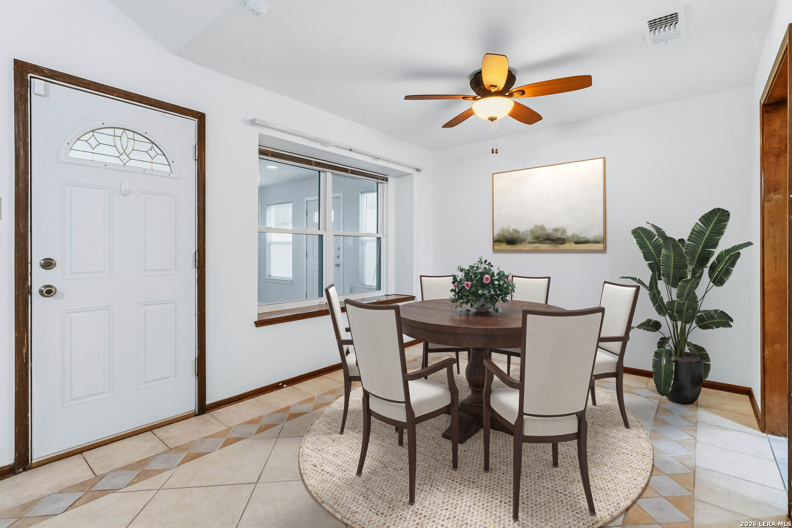 14658 Highland Ridge San Antonio, TX 78233 - Photo 3 of 35 a view of a dining room with furniture and a potted plant