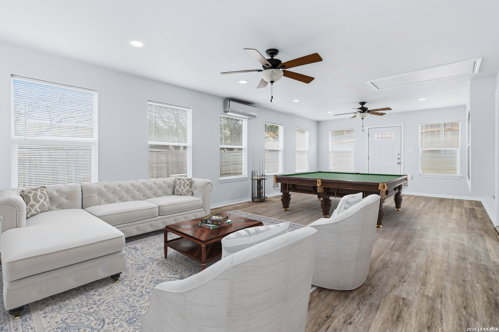 14658 Highland Ridge San Antonio, TX 78233 - Photo 5 of 35 a living room with furniture and a wooden floor