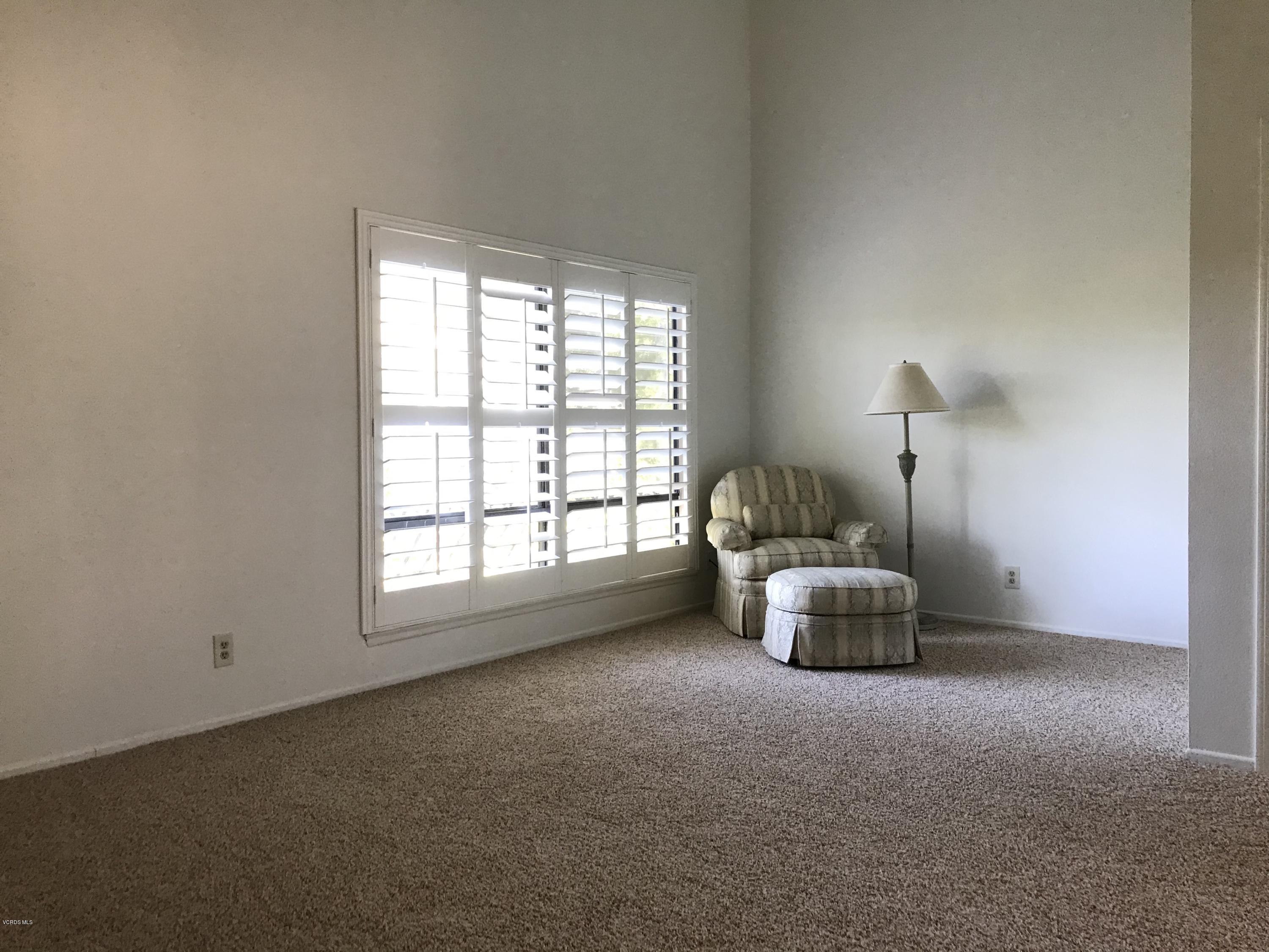 971 Thistlegate Road Oak Park, CA 91377 - Photo 22 of 33 an empty room with a window