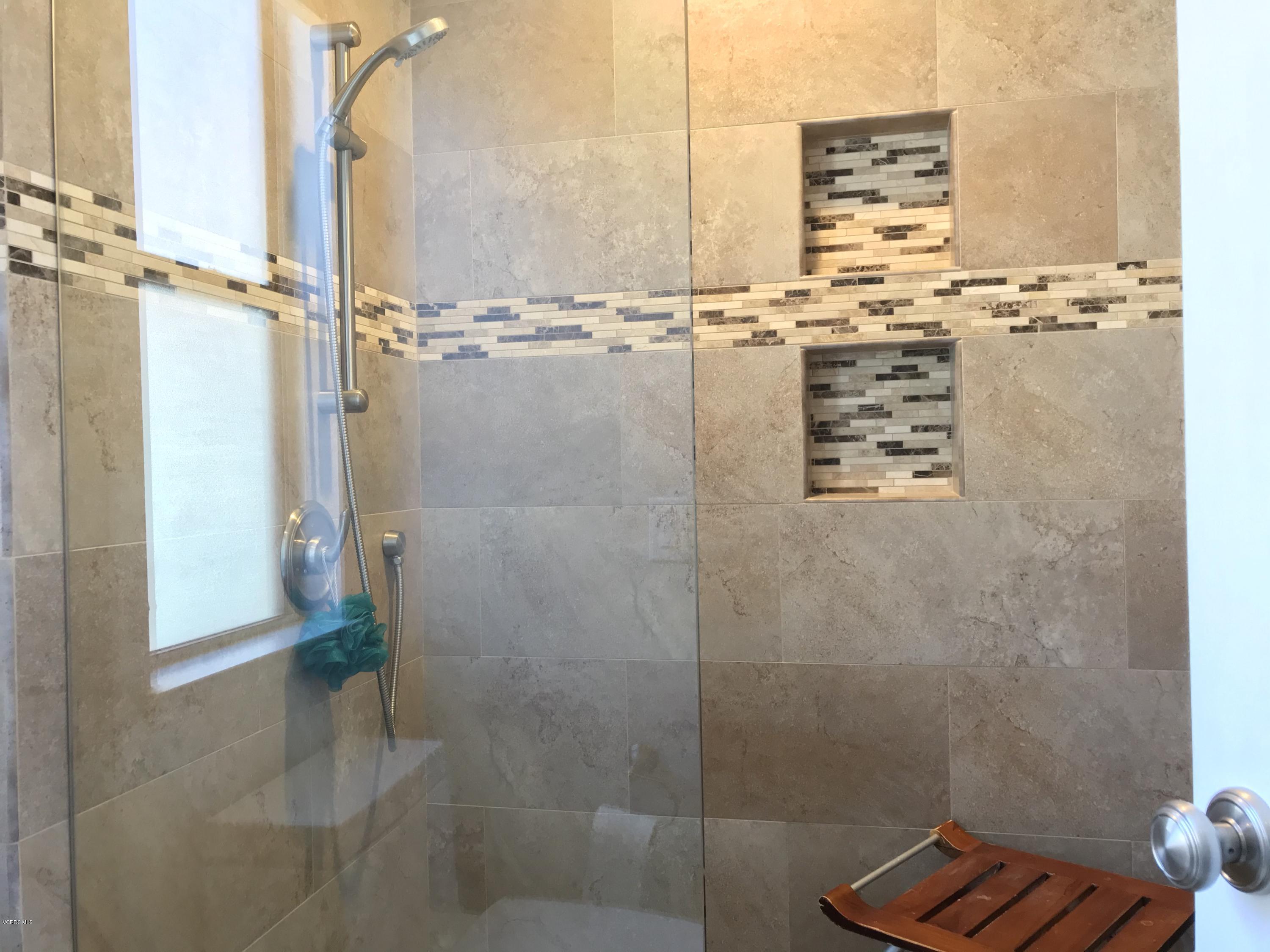 971 Thistlegate Road Oak Park, CA 91377 - Photo 29 of 33 a bathroom with a shower
