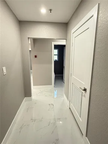 a view of livingroom with furniture and windows