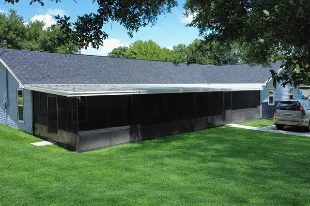 a view of backyard with hardwood