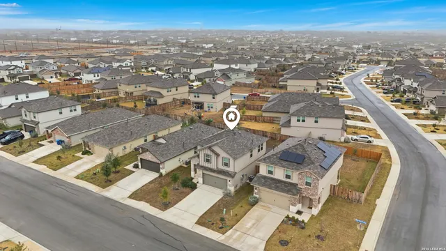 an aerial view of a city with lots of residential buildings