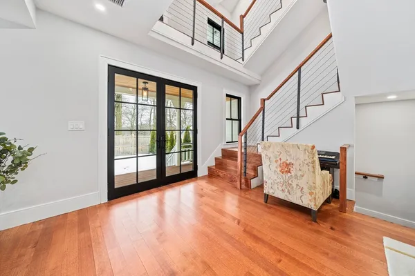 a view of an empty room with stairs