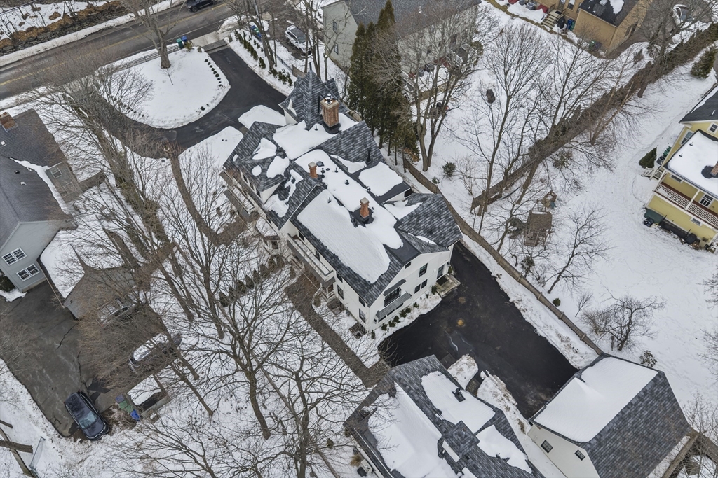 300 Elliot Street, Unit 2 Newton, MA 02464 - Photo 41 of 42 a aerial view of a house with chairs