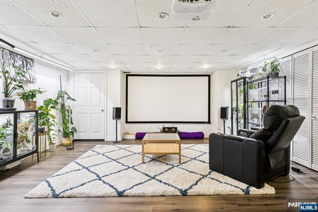 234 Spring Valley Road Park Ridge, NJ 07656 - Photo 27 of 40 a room with furniture projector and a table