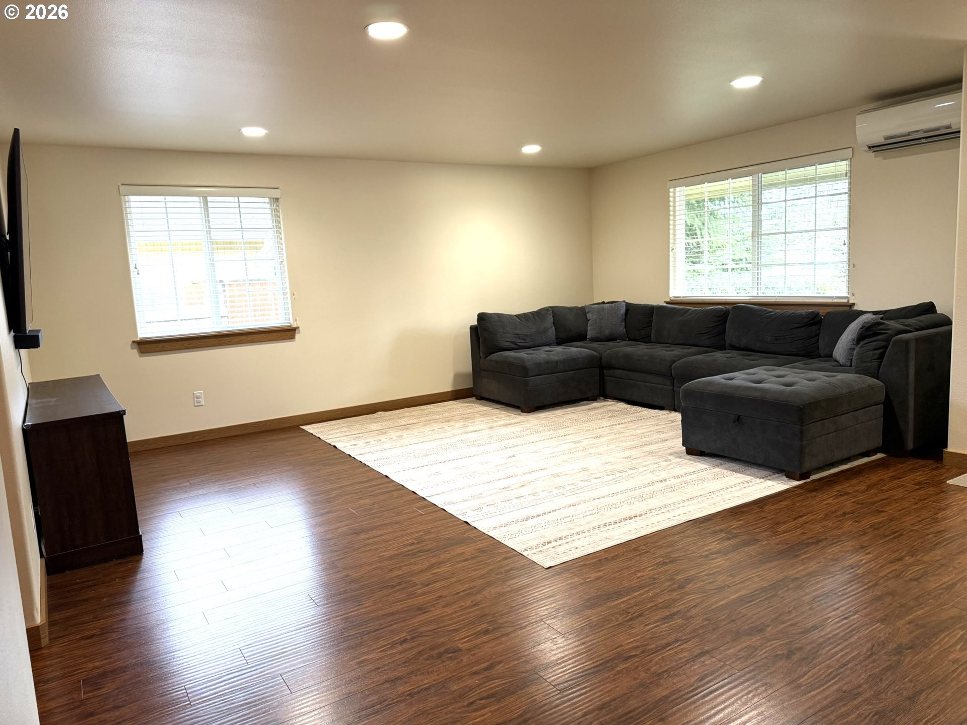 1651 29th Street Florence, OR 97439 - Photo 16 of 31 a living room with furniture window and wooden floor